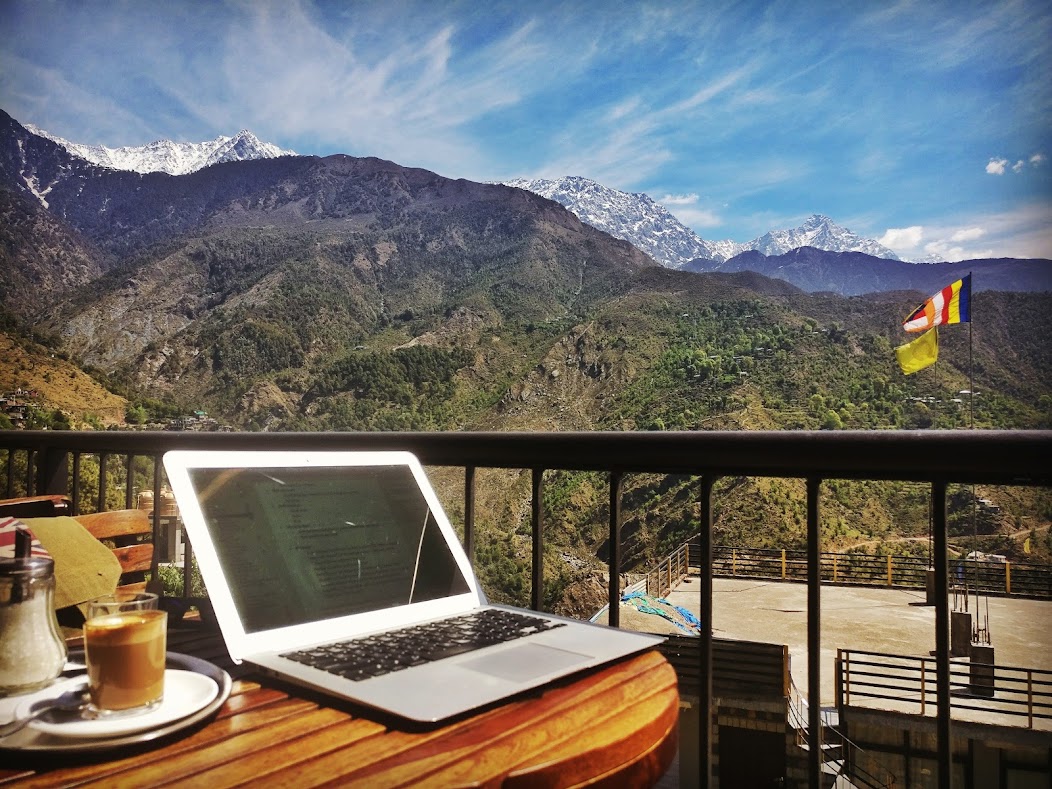 laptop in front of Himalayas